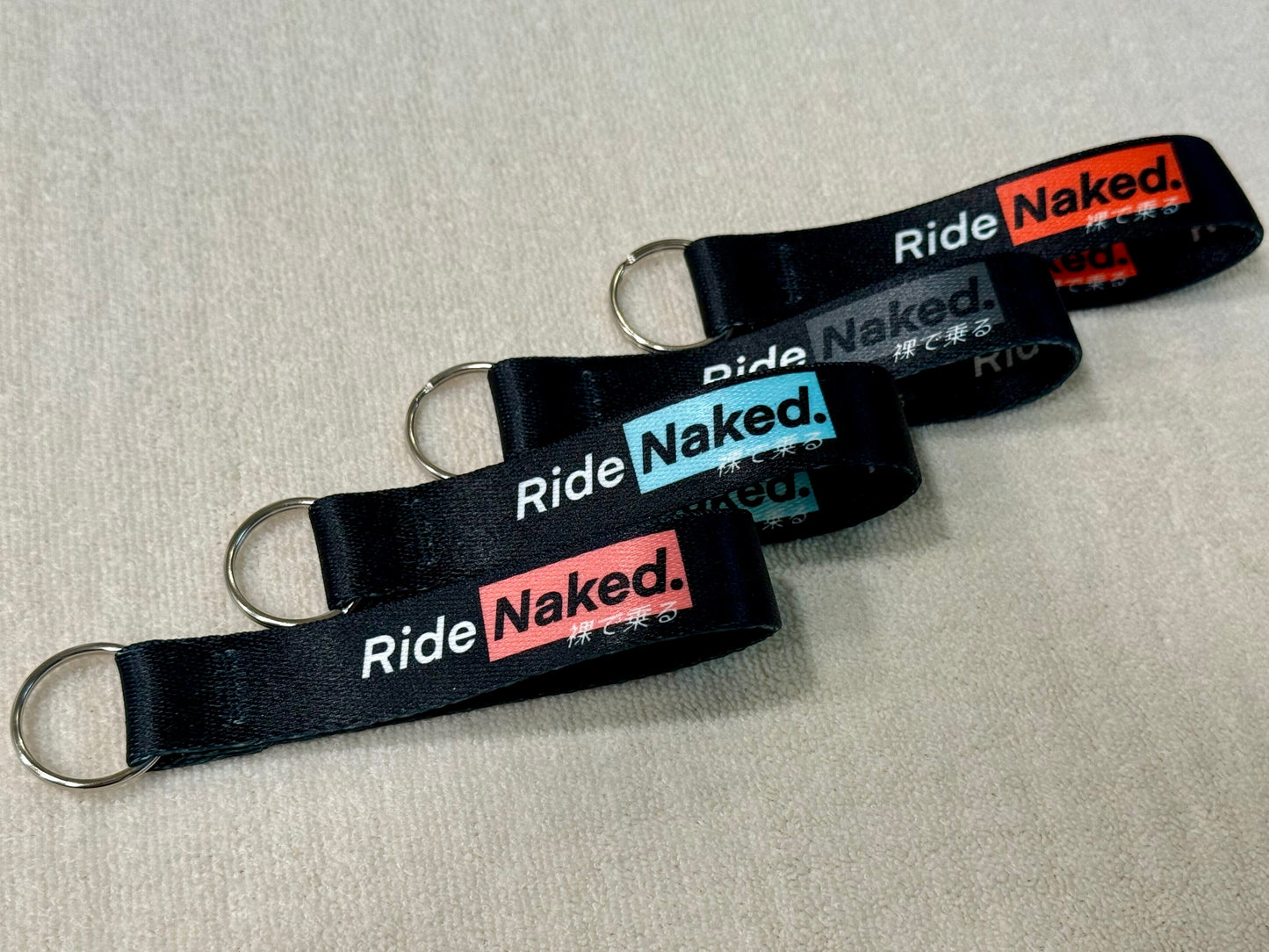Ride Naked Tag Keychain
